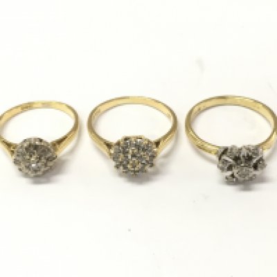 Three 18ct gold diamond and sapphire cluster rings. Size K 1/2 and M. 9.72 Postage A