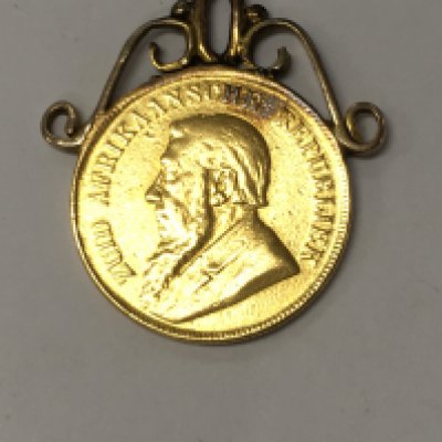 A mounted African 1898 gold coin total weight 8.9 grams