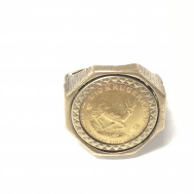 A 9ct gold ring set with a 1/10oz 1986 Krugerrand. Size J 1/2 and 9.29g