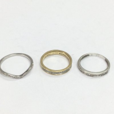 Three 9ct gold half hoop diamond rings, approx sizes N and I. Total approx 4.3g. Shipping category A.