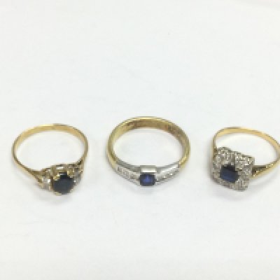 Three unmarked gold rings set with diamonds and sapphires, approx sizes N, P and L. Total approx 9.7g. Shipping category A.
