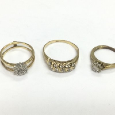 Three unmarked gold diamond cluster rings, approx sizes H, N and T.Total approx 8.3g. Shipping category A.