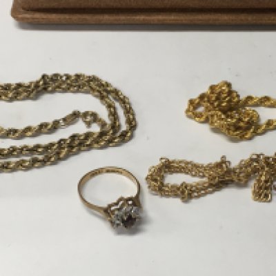 Three gold chains 7 grams and a gold ring inset with gem stones