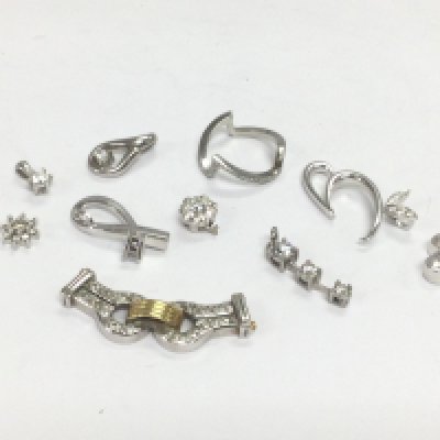 Ten white gold pendants set with diamonds, total approx 11.8g. Shipping category A.