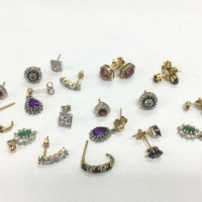A collection of gold earrings set with diamonds and various coloured stones, total approx 13.7g. Shipping category A.
