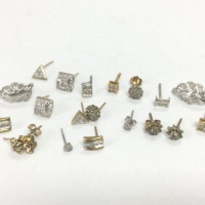 A collection of gold diamond cluster studs, total approx 9.7g. Shipping category A.