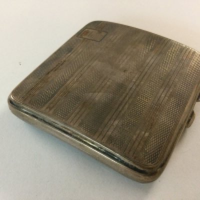 A silver cigarette case 97g