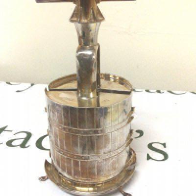 A Bispoke and unique silver corkscrew in the form of a barrel London hallmarks weight 800g approximately the lower edge with personal inscription. Height 21cm.