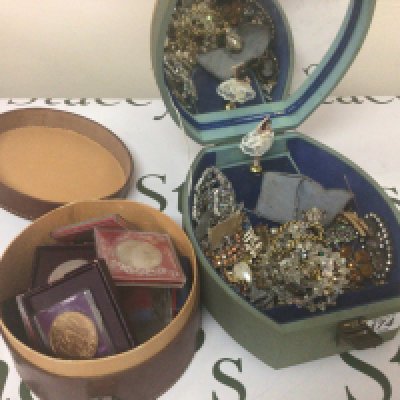 A leather collar box containing coins and a jewellery box containing costume jewellery (2)