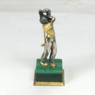 A small silver gilt figure of a golfer, approx height 8cm. Shipping category B.