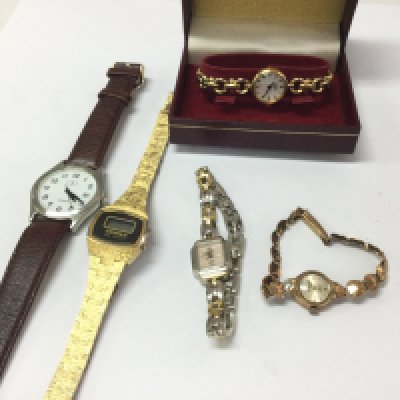 A collection of watches including a 9ct gold case and strap example 11.48g Postage B