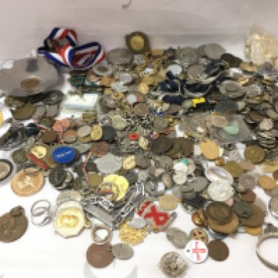 A collection of costume jewellery mixed coinage medals etc including some silver items. Postage B