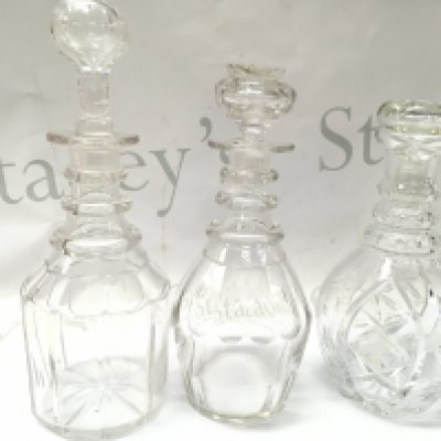 Three glass Decanters . 22 & 27cm tall This lot cannot be posted