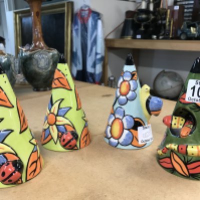 Four Lorna Bailey conical sugar shakers, including Limited Edition 118/250 = snake, 9th limited edition Snail, 6th limited edition Ladybird and one other ladybird shaker