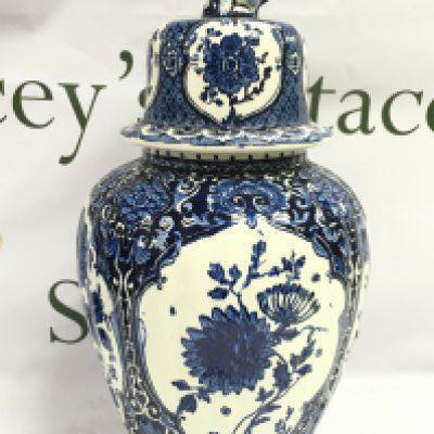 An early 20th century Dutch delft blue and white vase and cover made for royal sphinx by Boch. This lot cannot be posted
