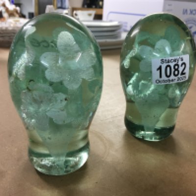 A pair of paper weights.