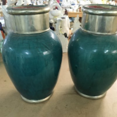 A pair of vases with metal collars. Approximately 13 inches tall