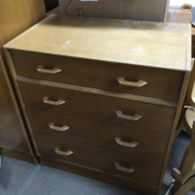 A mid 20th century oak G Plan chest of drawers (76cm wide 84cm tall) , Gentlemens wardrobe (88cm wide 122cm tall, and a pair of bedside tables .
