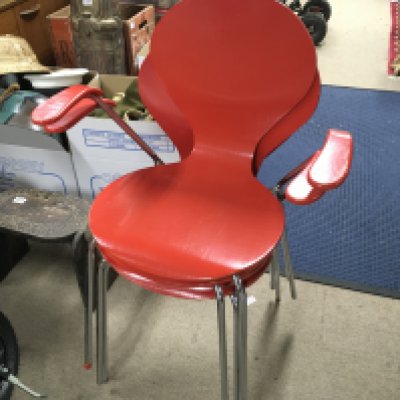 Four Danish design chairs. Red lacquered and chrome design 84cm tall 63cm wide