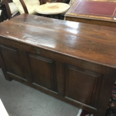 An 18th century oak chest 130cm wide 58cm long 70cm tall