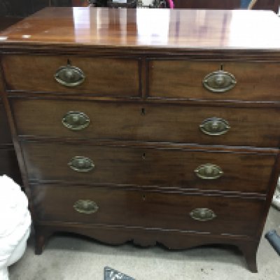 A Victorian mahogany chest of drawers fitted with two short and two long drawers