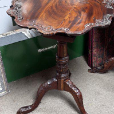 A Mahogany Tilt-top "birdcage" tripod table, in the George III style