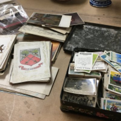 A collection of post cards and a collection of cigarettes .- NO RESERVE