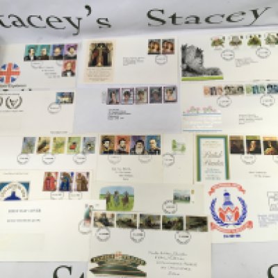 A small collection of assorted first day covers and book of stamps.