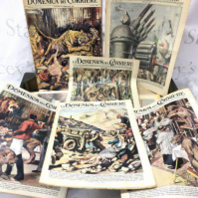 A box of Domenica del Corriere paper magazines from the 1950s-1960s.