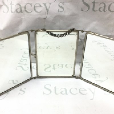 A good vintage three mirror carrying mirror with chain, handle and embossed flower covers. Each panel 18x24cm This lot cannot be posted