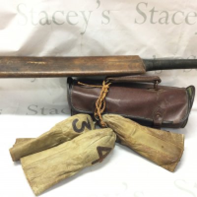 A set of three vintage bowls in leather case, cricket bat and a set of three very early leather golf club heads covers no 2,3,4 .this lot cannot be posted