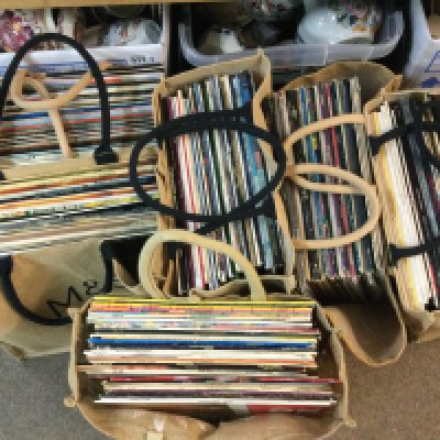 A collection of vinyl records including Madness, The Seekers, Elvis, compilations etc