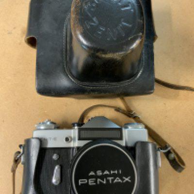 A Zenit - E Soviet SLR camera with attached lense.- NO RESERVE