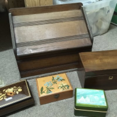 Boxes including two small musical jewellery boxes .