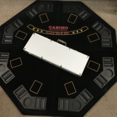 A poker set including chips, fold up table . This lot cannot be posted