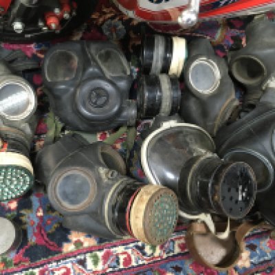 A collection of gas masks . This lot cannot be posted
