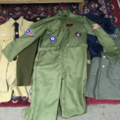 A collection of retrospective military uniforms including a Waffen SS field-grey wool jacket with Sicherheitspolizei (SD) badge, Grenadier Guarss jacket , Afrikakorps shirt, webbing etc