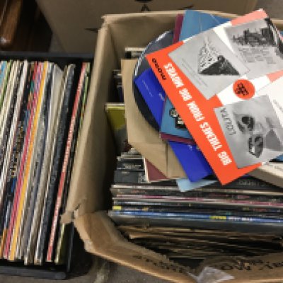 A collection of vinyl records including LPS and Singles by Black Sabbath, Rush, Peter Tosh, The Jam etc