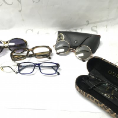 A Collection of sunglasses including Ray Ban, Guess and other named frames . Postage category B