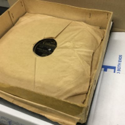 A box of LPs and 78s including Peggy lee, Sinatra, Ella Fitzgerald