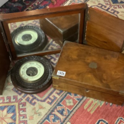 A vintage mahogany framed folding mirror, brass fitted writing slope, circular wall barometer.