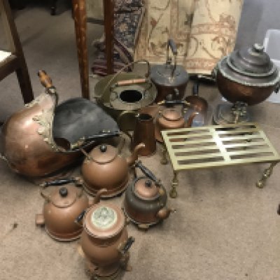 A collection of Copper jugs and kettles, Samovar , brass footman for fireplace, copper coal scuttle. This lot cannot be posted
