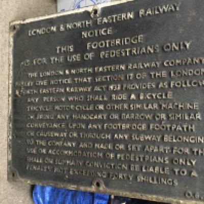 A cast iron sign , London and North eastern Notice for footbridge.50x 62 cm