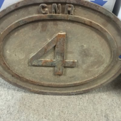 A oval cast iron railway GNR bridge plate, No 4
