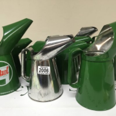 A collection of unused Castrol motor oil cans Quarter and pint size some unpainted and without Castrol badge.