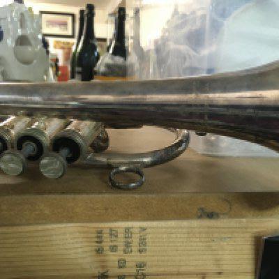 A cornet in a fitted case ..