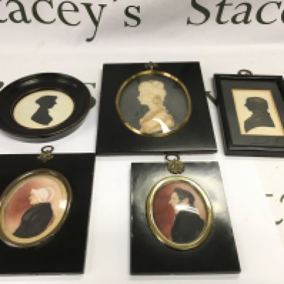 A framed waxed portrait minature by Lesley Ray, together with two framed silhouettes and two Georgian miniatures