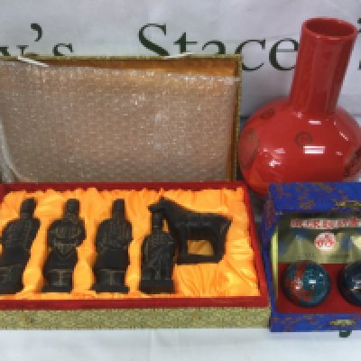 A collection of modern Oriental ornaments including a puzzle ball, vase etc. Shipping category D.- NO RESERVE