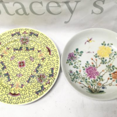 Two Chinese Famille rose dishes one with red glaze six character mark and one yellow. 21 & 18cm wide approximately. This lot cannot be posted