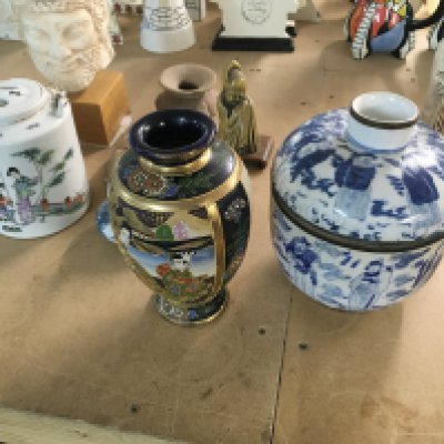 A Chinese blue and white porcelain bowl with lid along with other oriental items. Postage D